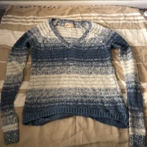 A blue and white Hollister sweater
